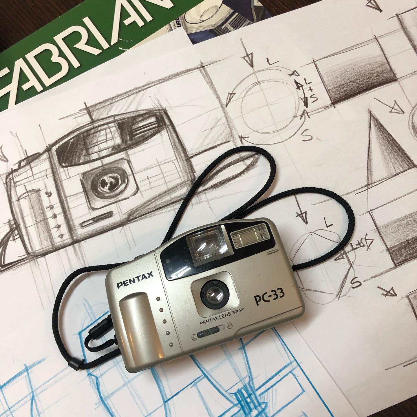 Camera sketches beside the reference. From Sketch Academy classes